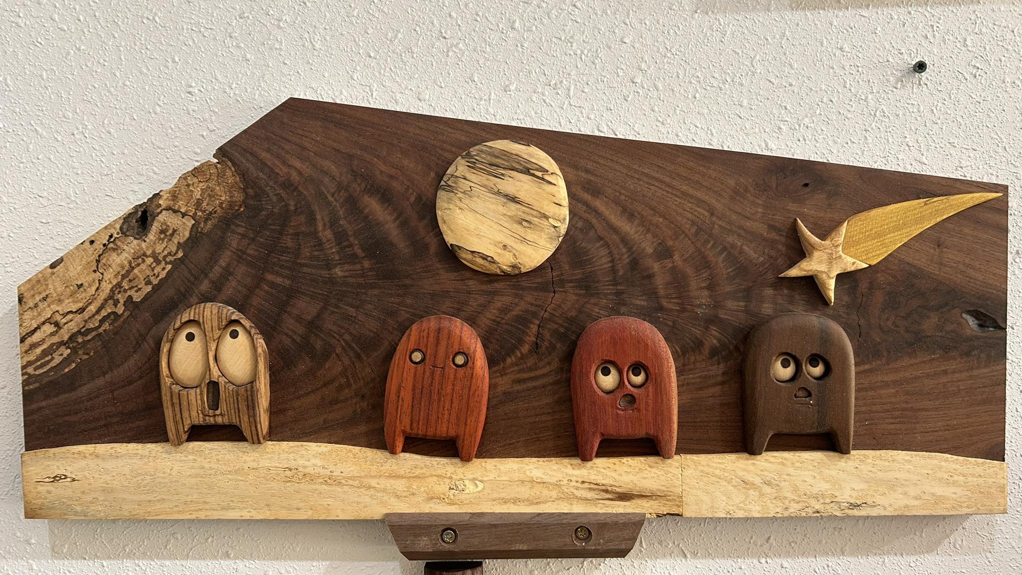 Original carved wood wall piece with whimsical wood creatures
