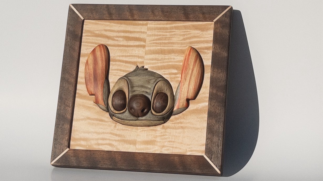 Hand-carved dimensional character portrait in figured maple and walnut